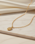 The Elliptical Gold Pendant Necklace