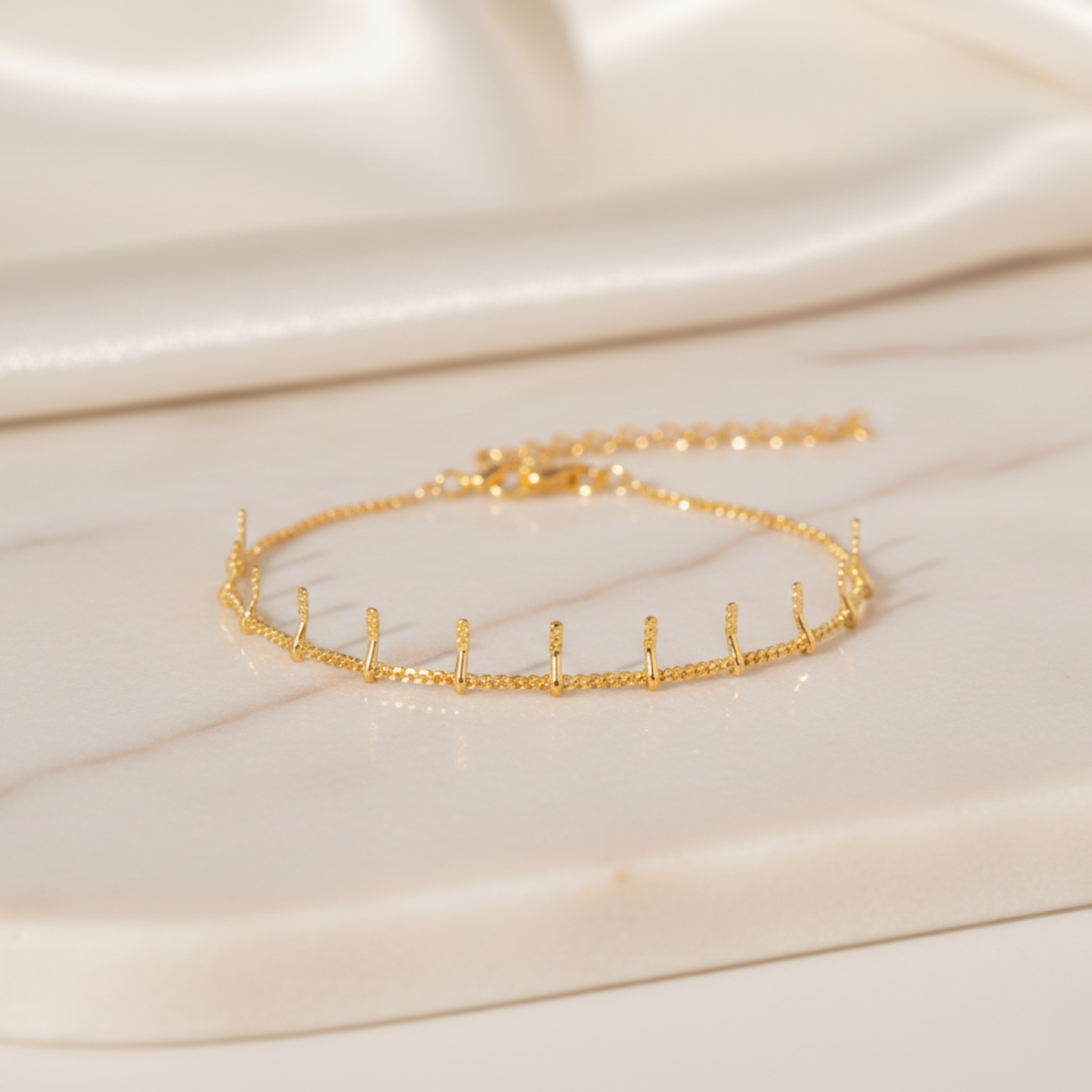 Sleek Charm Gold Bracelet