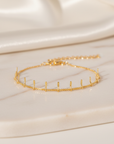 Sleek Charm Gold Bracelet